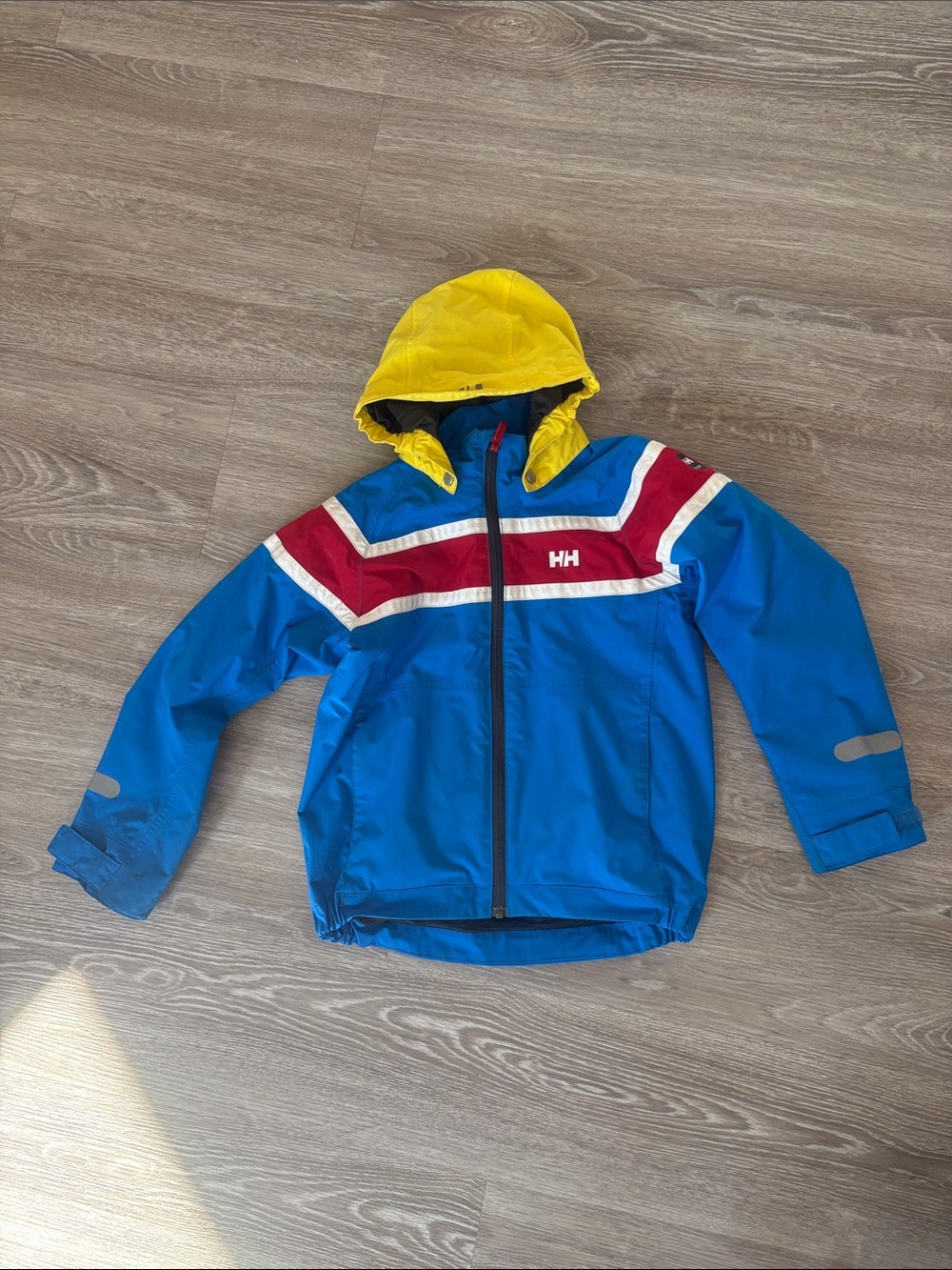Helly Hansen Blue Jacket with Yellow Hood and Red Accents